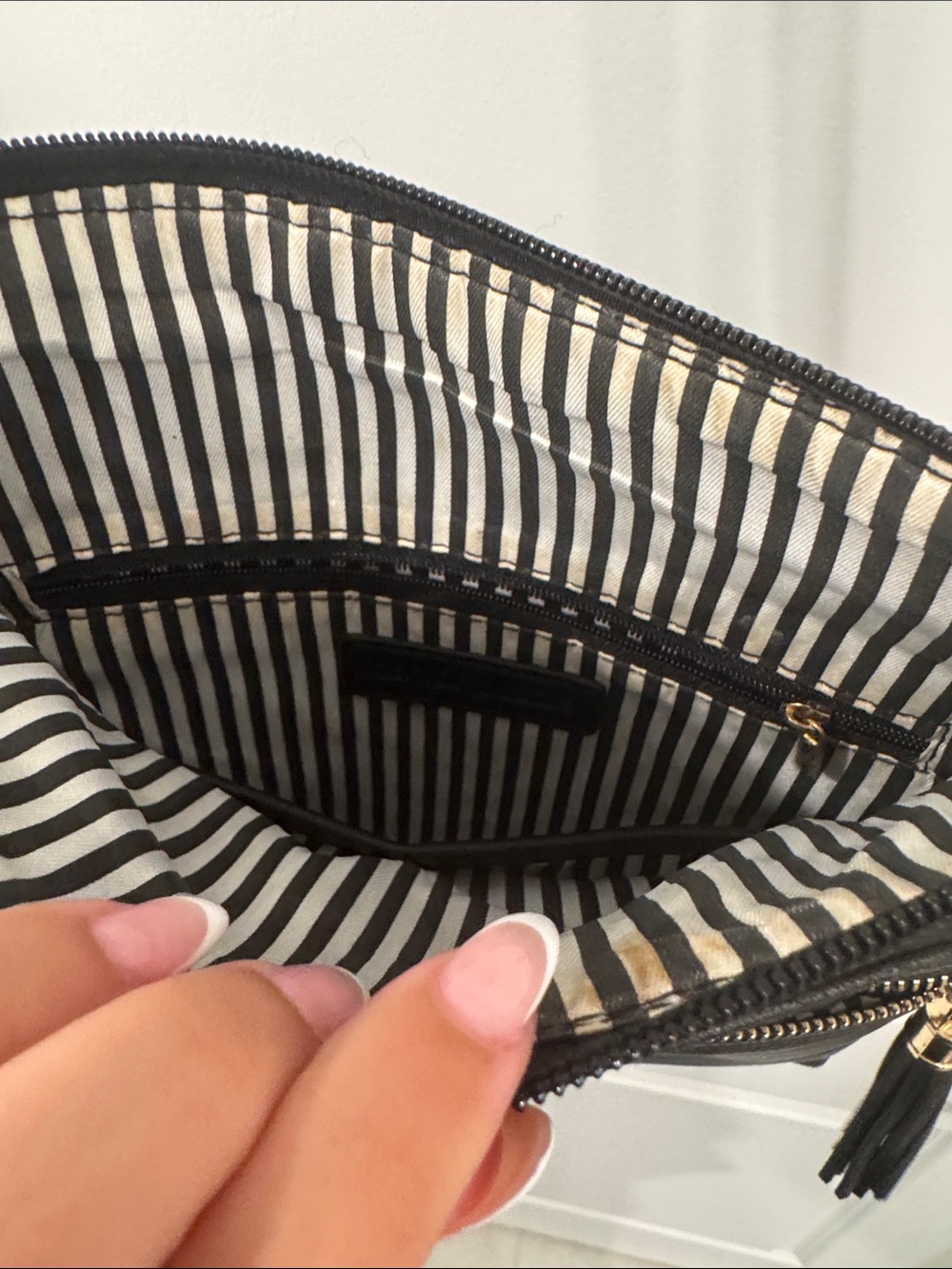 Classic Black Crossbody Bag with Gold Tassel Accents - Picture 4 of 5
